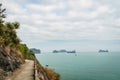 Mountain road by the ocean in Cat Ba, Ha long Bay, Vietnam, South East Asia. Royalty Free Stock Photo