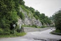 A mountain road with passing cars, Dombay, Karachay-Cherkessia, Russia