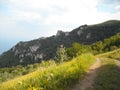 The mountain road and the peaks are beautiful