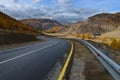 A mountain road in the Republic of Altai Russia. Mountain road, beautiful view of the snowy mountains Royalty Free Stock Photo