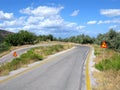 Mountain road, sharp turn, road signs Royalty Free Stock Photo