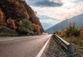 Mountain road and sky with sunbeams in Georgia