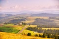 Mountain road at summer sunset. Curved asphalt road on top of the hills. Pieniny and  Beskidy range Royalty Free Stock Photo