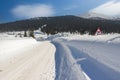 Winter road covered with snow on sunny day Royalty Free Stock Photo