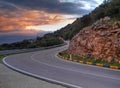 Mountain road at sunset. Royalty Free Stock Photo