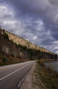 Mountain road under a cloudy sky