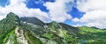 Mountain road in the Tatra mountains with clear lake. Freedom, adventure concept. Poland. Royalty Free Stock Photo