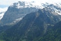 A mountain of rocks covered by the rests of the snow in region Engelberg.