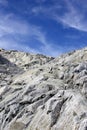 Mountain Rocks And White Clouds