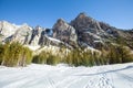 Mountain rocky landscape with fir wood forest and snow. Ortisei, Italy Royalty Free Stock Photo