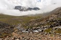 Mountain rocky slope with a rivulet.