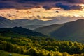 Mountain rural area in springtime at cloudy sunset Royalty Free Stock Photo