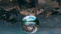 Mountain scenery reflection in a glass ball, lensball. klontalersee in the alps Royalty Free Stock Photo