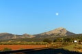 mountain scenery with train track and full moon Royalty Free Stock Photo