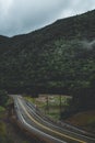 Mountain scenic winding road after the rain