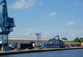 Scrap metal loaded onto truck, Dockside