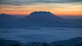 Mountain and sea of fog sunrise surrounded with mountain and forest at huai nam dang national park chiang mai, thailand