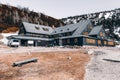 Mountain shelter in a winter sunny day, Giant Mountains, Poland Royalty Free Stock Photo