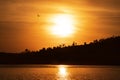 Mountain silhouette on the river with sunset. Portugal. with bird Royalty Free Stock Photo