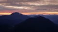 Mountain silhouettes during sunrise from Jochberg Walchensee, Bavaria Germany