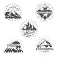 Mountain sketch vector logo set in retro style. Vintage trendy lines mountains silhouettes labels