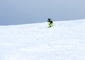 Mountain skiing, child boy skiing down the mountain