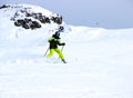 Mountain skiing, child boy skiing down the mountain Royalty Free Stock Photo