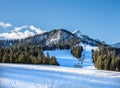 Mountain skiing slopes and ski lift at Hausberg top near Garmisc Royalty Free Stock Photo