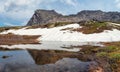 Mountain Sleeping Sayan, Natural Park Ergaki, Russia. A unique mystical mountain is reflected in a glacial lake. Panoramic view Royalty Free Stock Photo