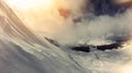 Mountain slope, a lot of snow, the view through the clouds. Winter landscape. Royalty Free Stock Photo