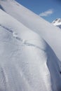 Mountain slope and snow cornice Royalty Free Stock Photo