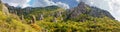 Mountain slope with weathered rocks among the forest in fall Royalty Free Stock Photo