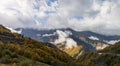 Mountain  slopes covered with forests and low thunderclouds in Svaneti in the mountainous part of Georgia Royalty Free Stock Photo