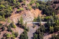 Mountain slopes with trees, terrases and roads in the Troodos re