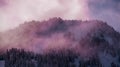 Mountain slopes in the Violet clouds Royalty Free Stock Photo