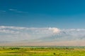 Mountain Small Ararat behind a cloud and green field, beautiful landscape