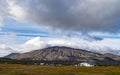 Mountain of Snaefellsjokull National Park with white cloudy cap on peak. Iceland