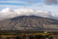 Mountain of Snaefellsjokull National Park with white cloudy cap on peak. Iceland