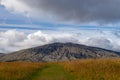 Mountain of Snaefellsjokull National Park with white cloudy cap on peak. Iceland