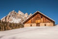 Mountain stable in the Tofane range over a blue sky after a snow Royalty Free Stock Photo