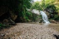 mountain stream among the rocks in the forest in nature journey hiking Royalty Free Stock Photo