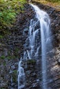 Mountain stream and rocky waterfall. Tourist and geological landmark. Waterfall Guk. Carpathians,