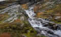 A mountain stream in the Strynefjellet Mountains in Norway that flows from the Skjerdingdalsbreen Glacier