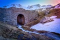 Mountain stream waterfall landscape and bridge at sunset, Pyrenees