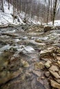 Mountain stream in winter scenery. Prowcza Stream, Bieszczady National Park, Carpathian Mountains, Poland. One of the most popular Royalty Free Stock Photo