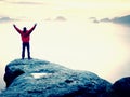 Mountain summit. Happy man gesture raised arms. Funny hiker with raised hands in the air Royalty Free Stock Photo