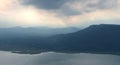 Mountain with sunlight at Lam Takong reservoir dam