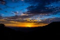 mountain sunset having clouds sky Royalty Free Stock Photo