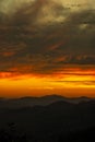 mountain sunset having clouds sky Royalty Free Stock Photo