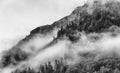 Fog covering the mountain forests with low cloud in Juneau alaska for fog landscape Royalty Free Stock Photo